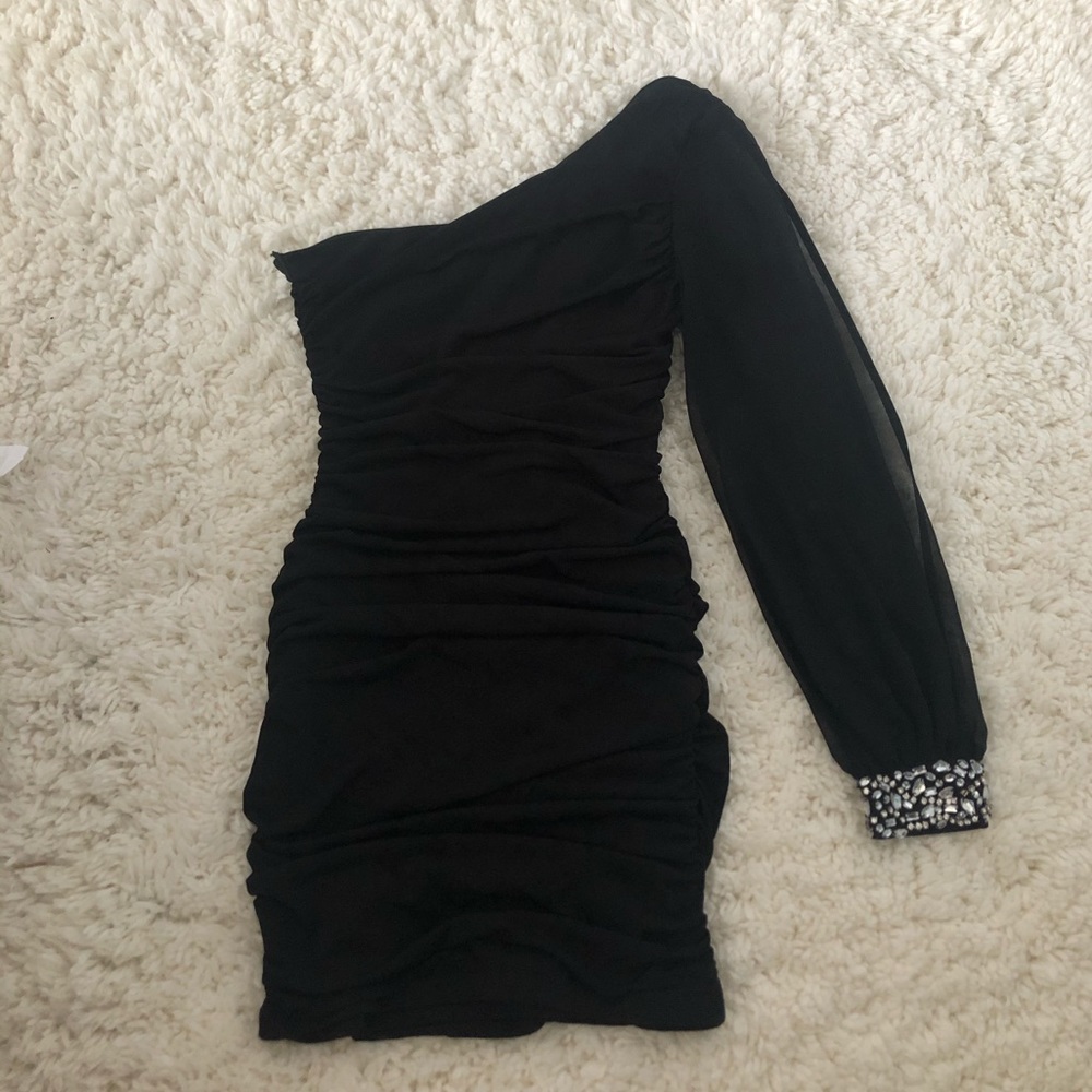 Little black dress with sleeve accent and details